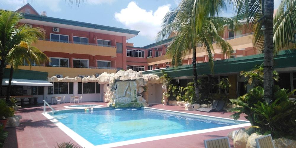 Peten Esplendido Flores Bagian luar foto